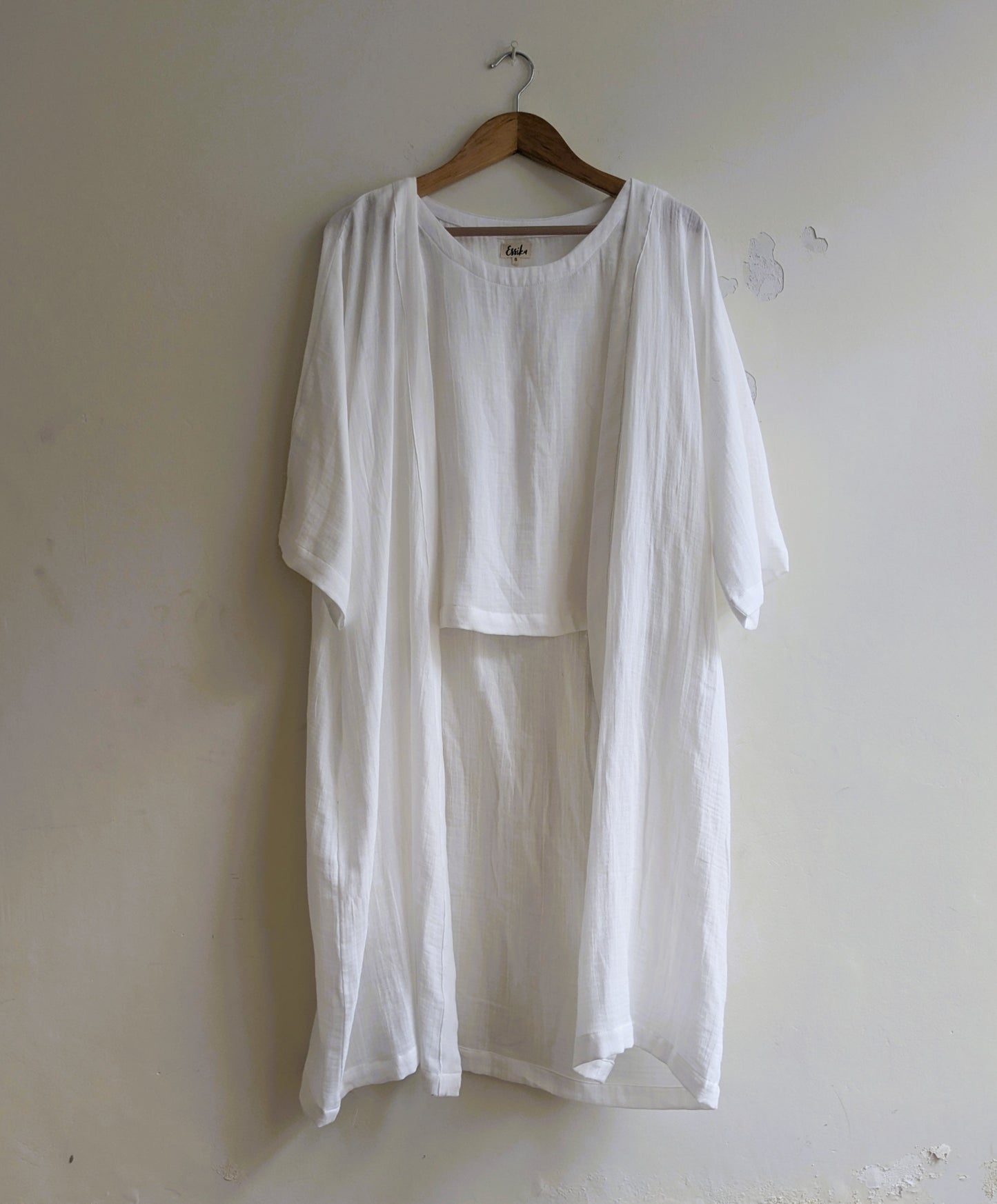 Women's dojo wrap in white cotton along with white sleeveless top inside - Front Image