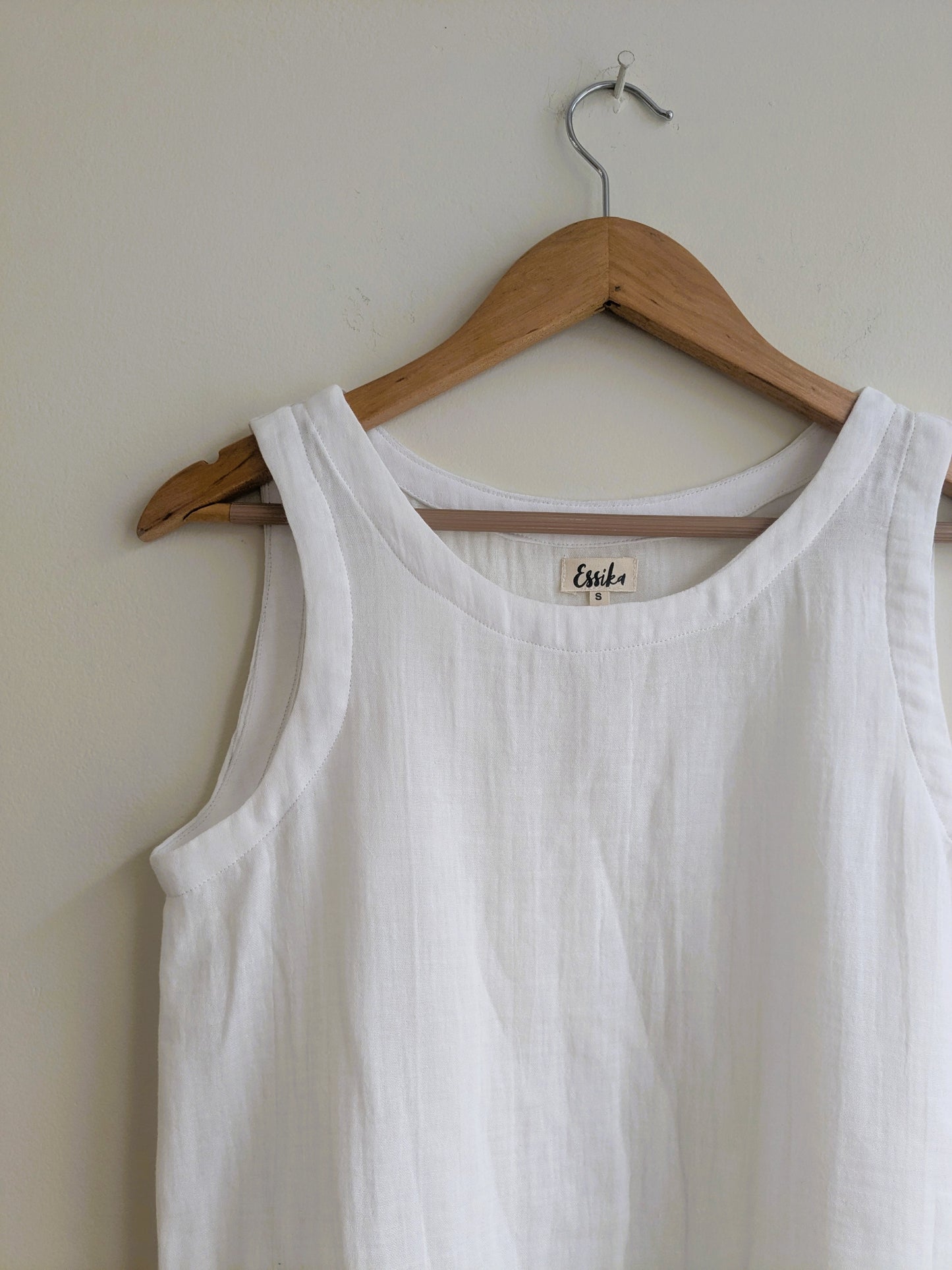 Women's sleeveless top in white, cotton gauze - closeup image