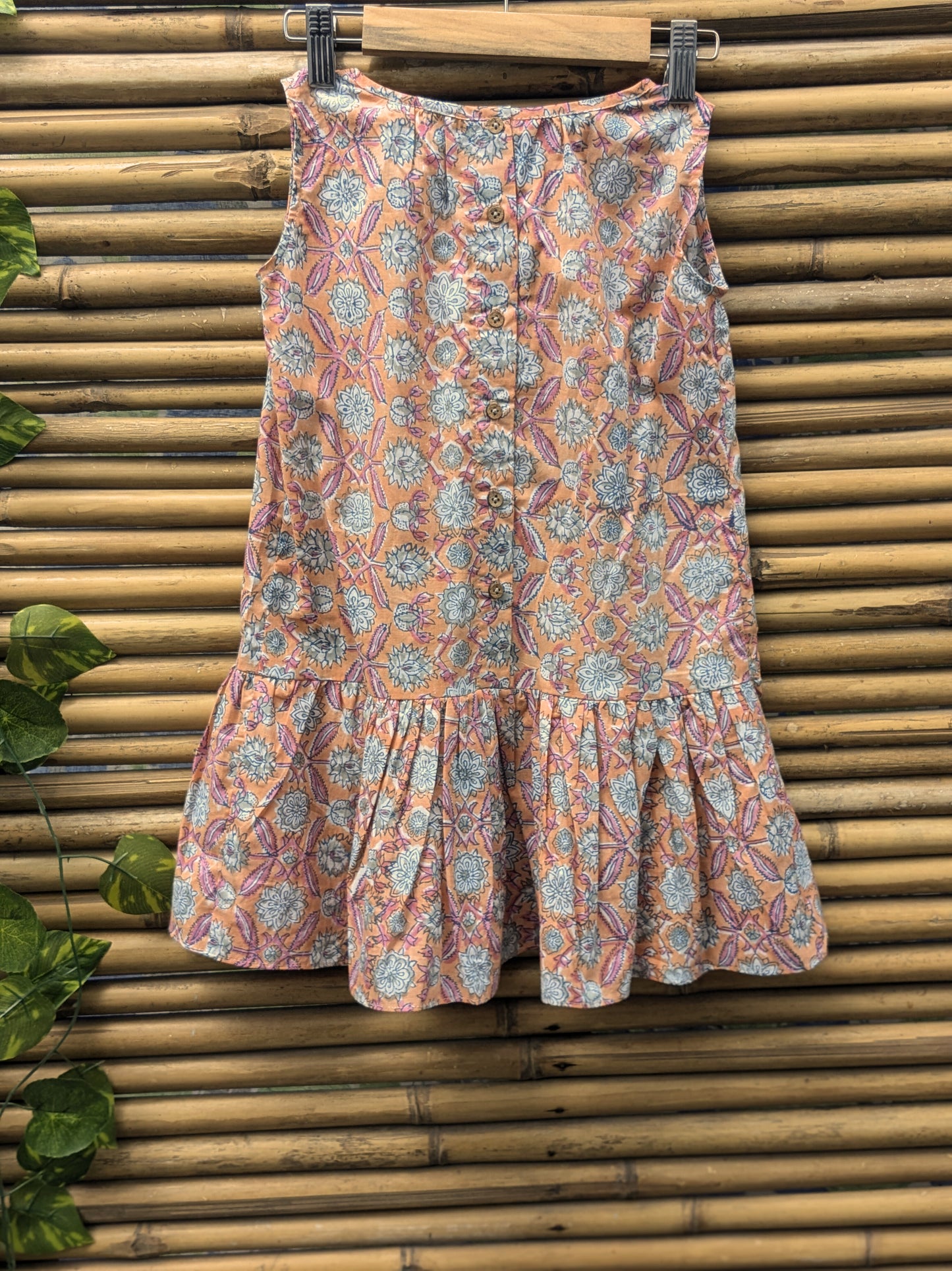 Girls sleeveless dress in orange and pink - back image