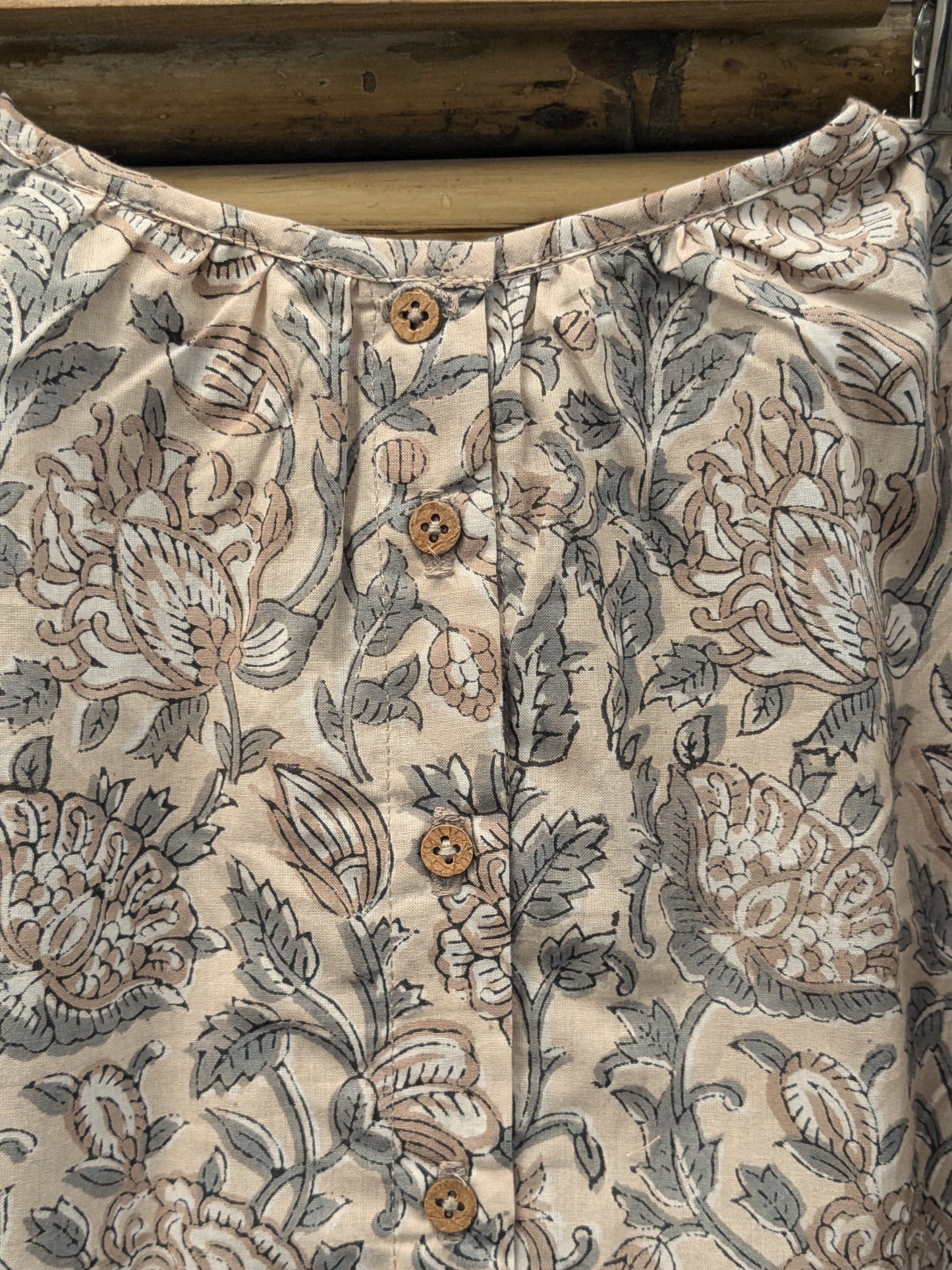 Girls sleeveless dress in brown and grey - closeup image