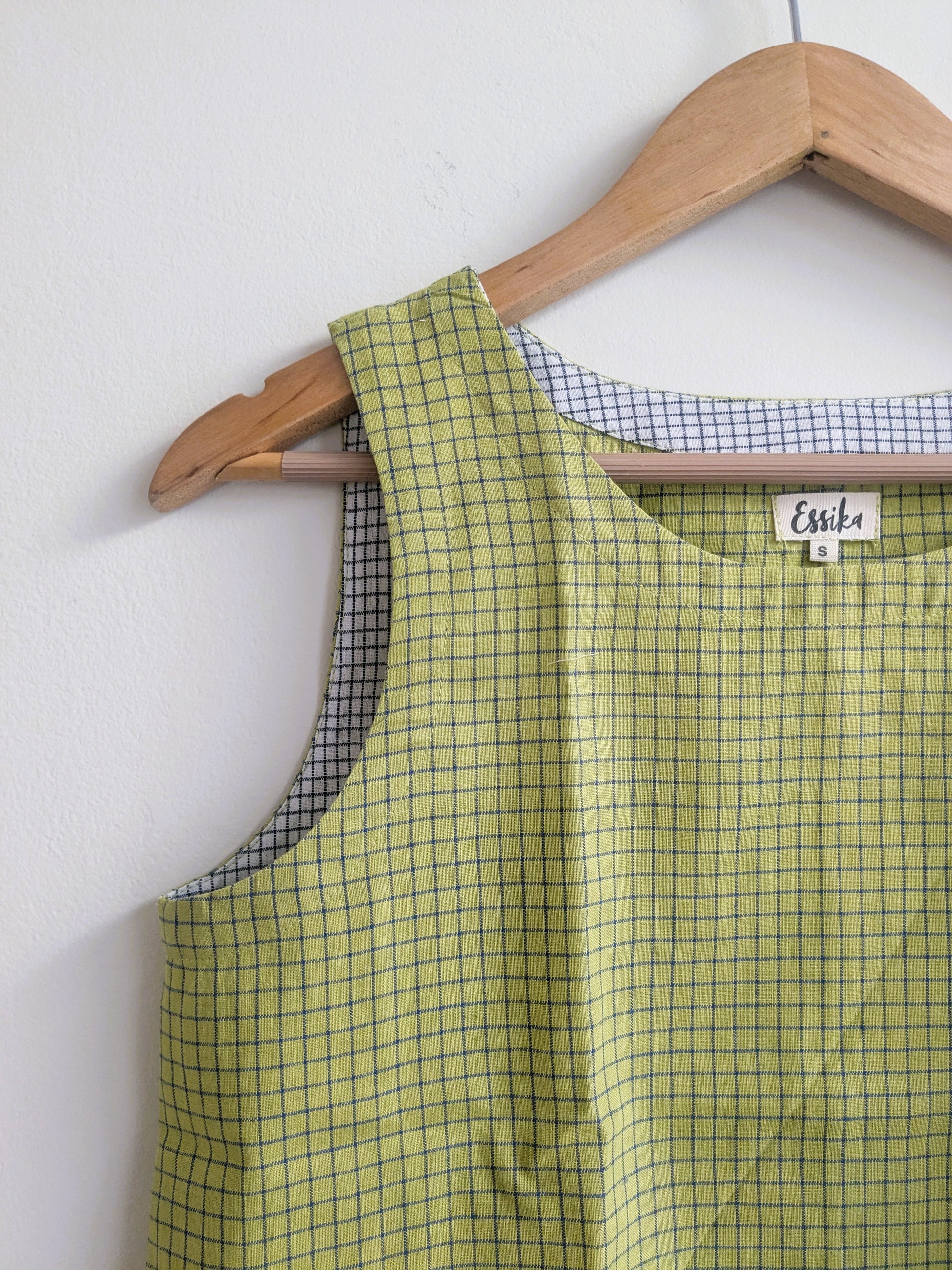 Women's sleeveless top in handloom cotton in green checks - closeup image