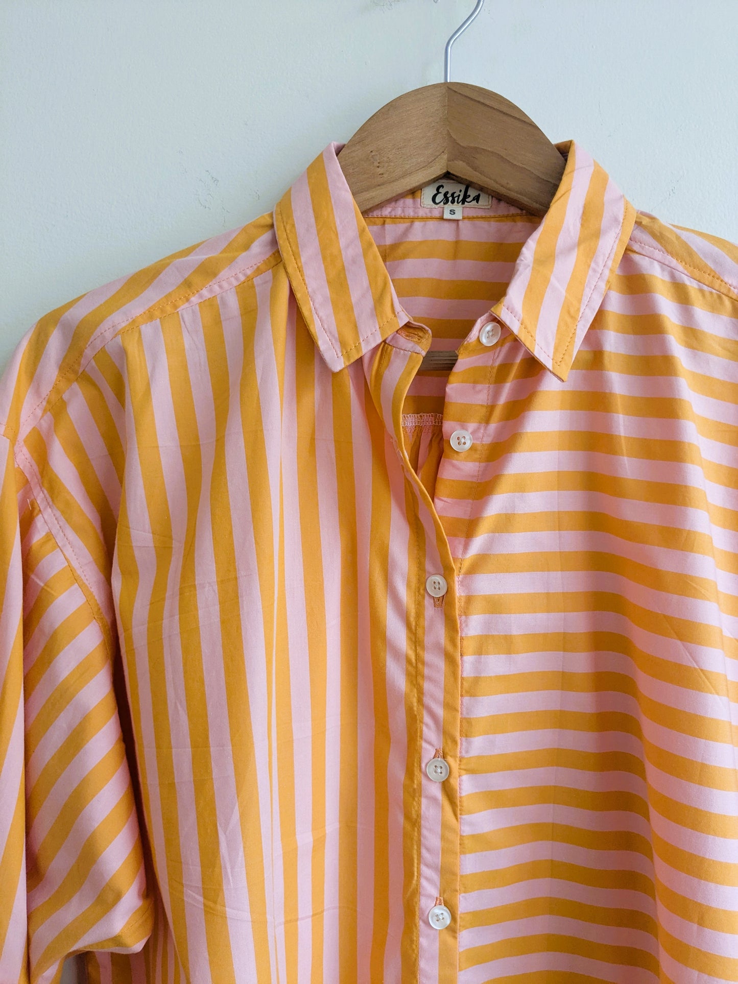 Women's oversized cotton shirt in orange and pink stripes with full sleeves - closeup image