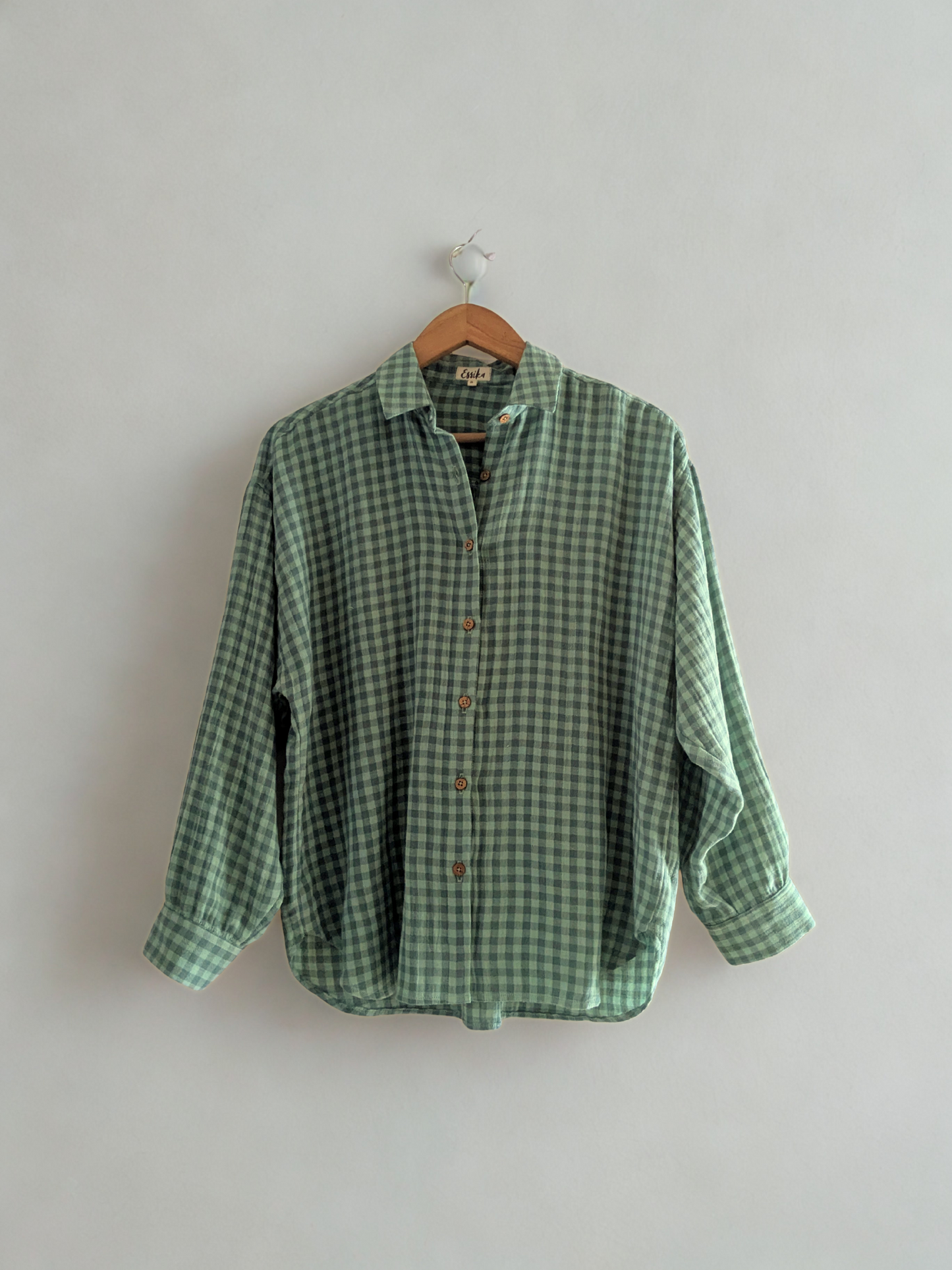 Women's oversized shirt in cotton gauze, full sleeves in green checks - front image
