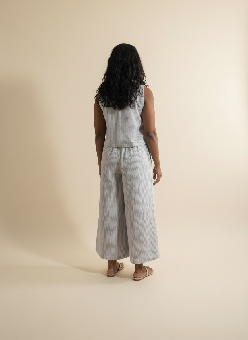 Women's coord set in cotton. Sleeveless top and wide legged pants in grey stripes - Model back image.