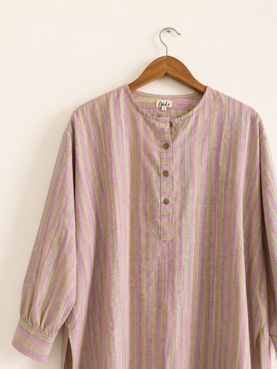 Women's handloom cotton kurta with round neck, full sleeves with cuffs, in pink stripes - closeup image