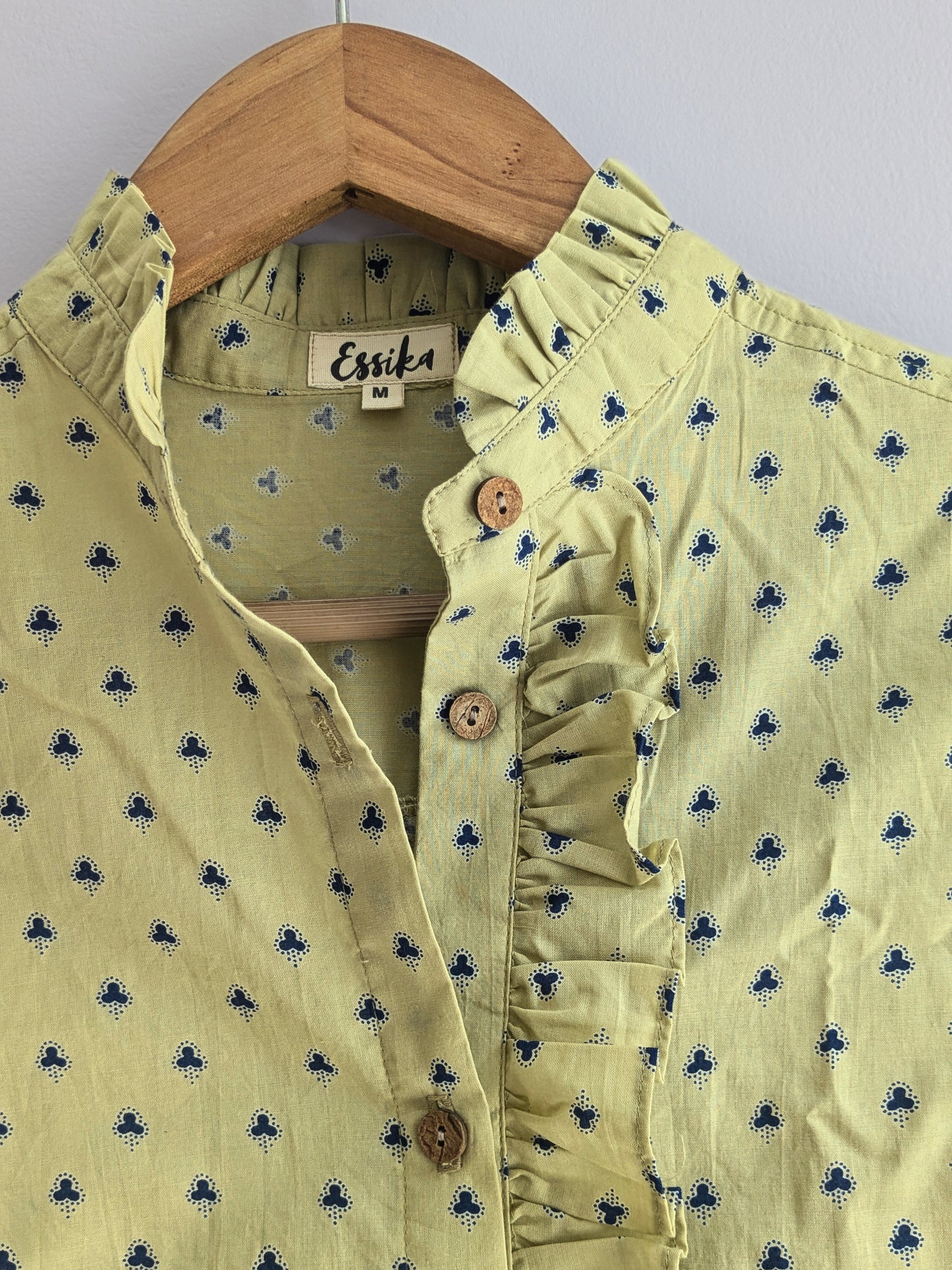 Women's full sleeves cotton ruffle shirt in lemon yellow -Closeup Image