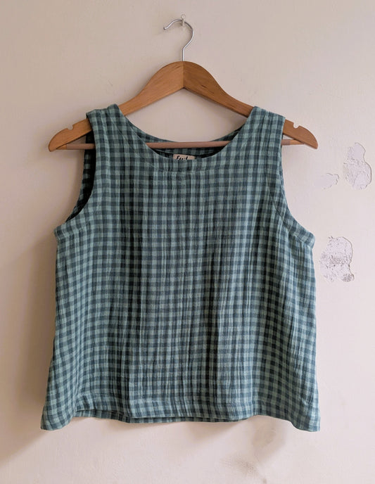 Women's sleeveless cotton top in green checks - front image