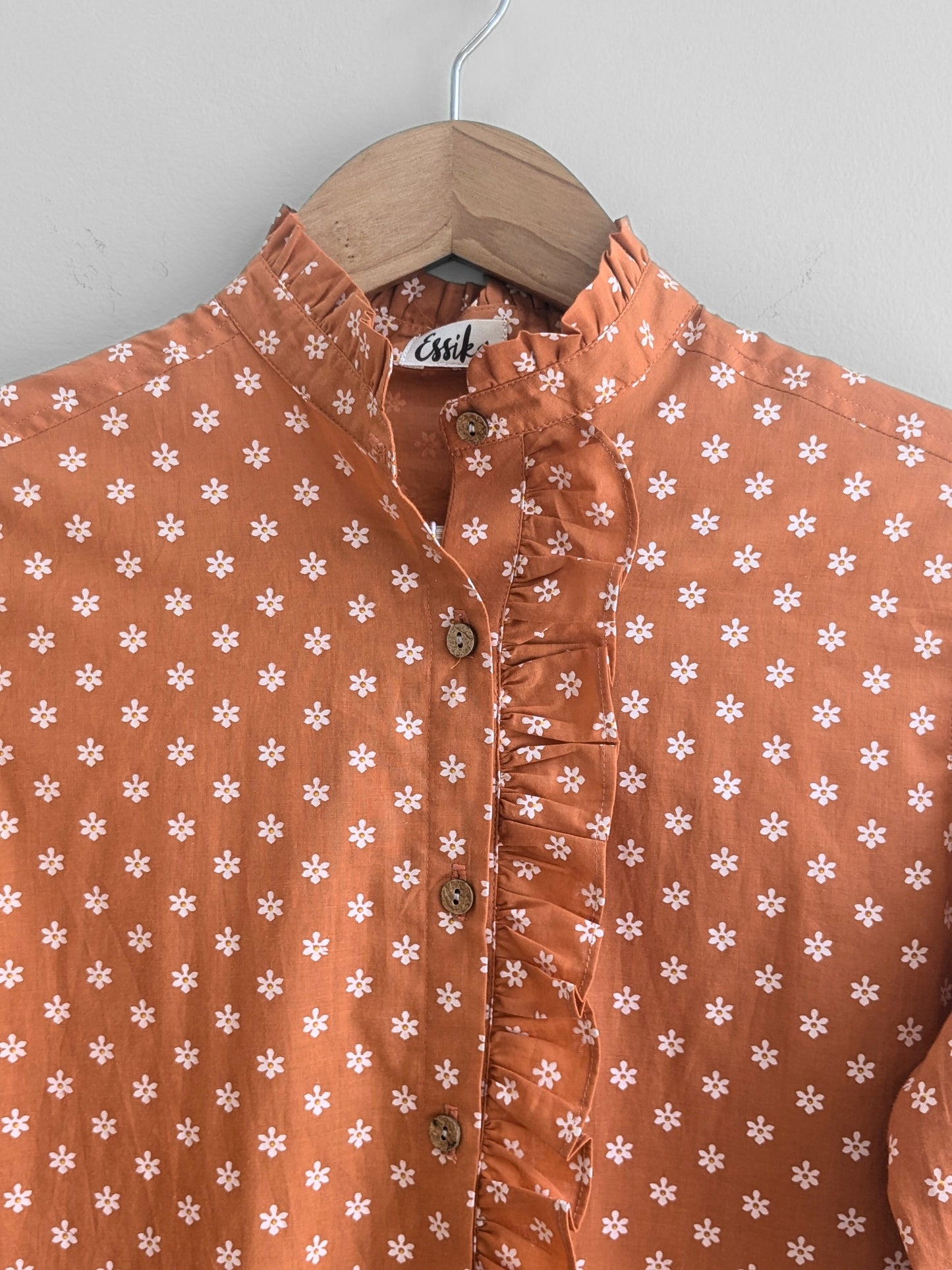 Women's full sleeves cotton ruffle shirt in  orange  - closeup image