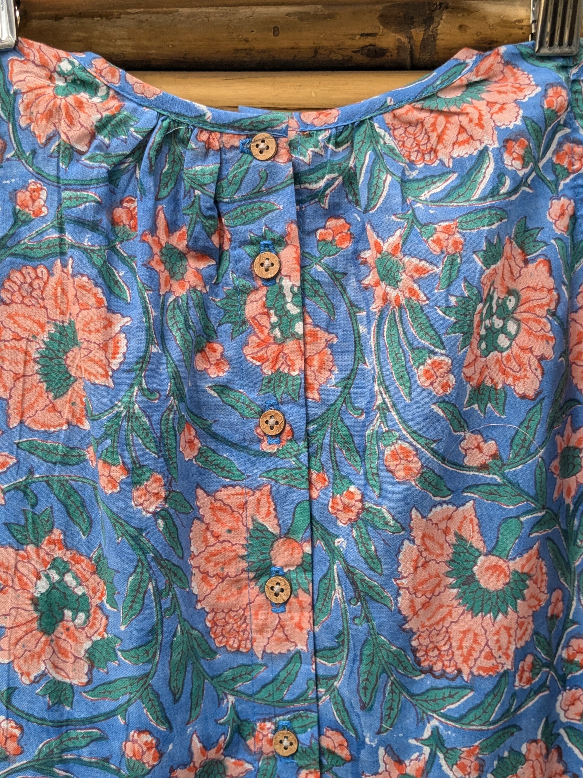 Girls cotton sleeveless dress in blue and orange - closeup image