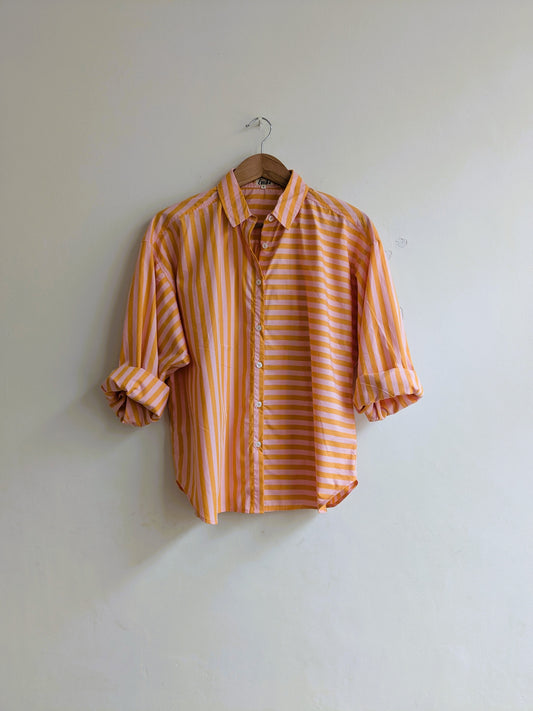 Women's oversized cotton shirt in orange and pink stripes with full sleeves - front image
