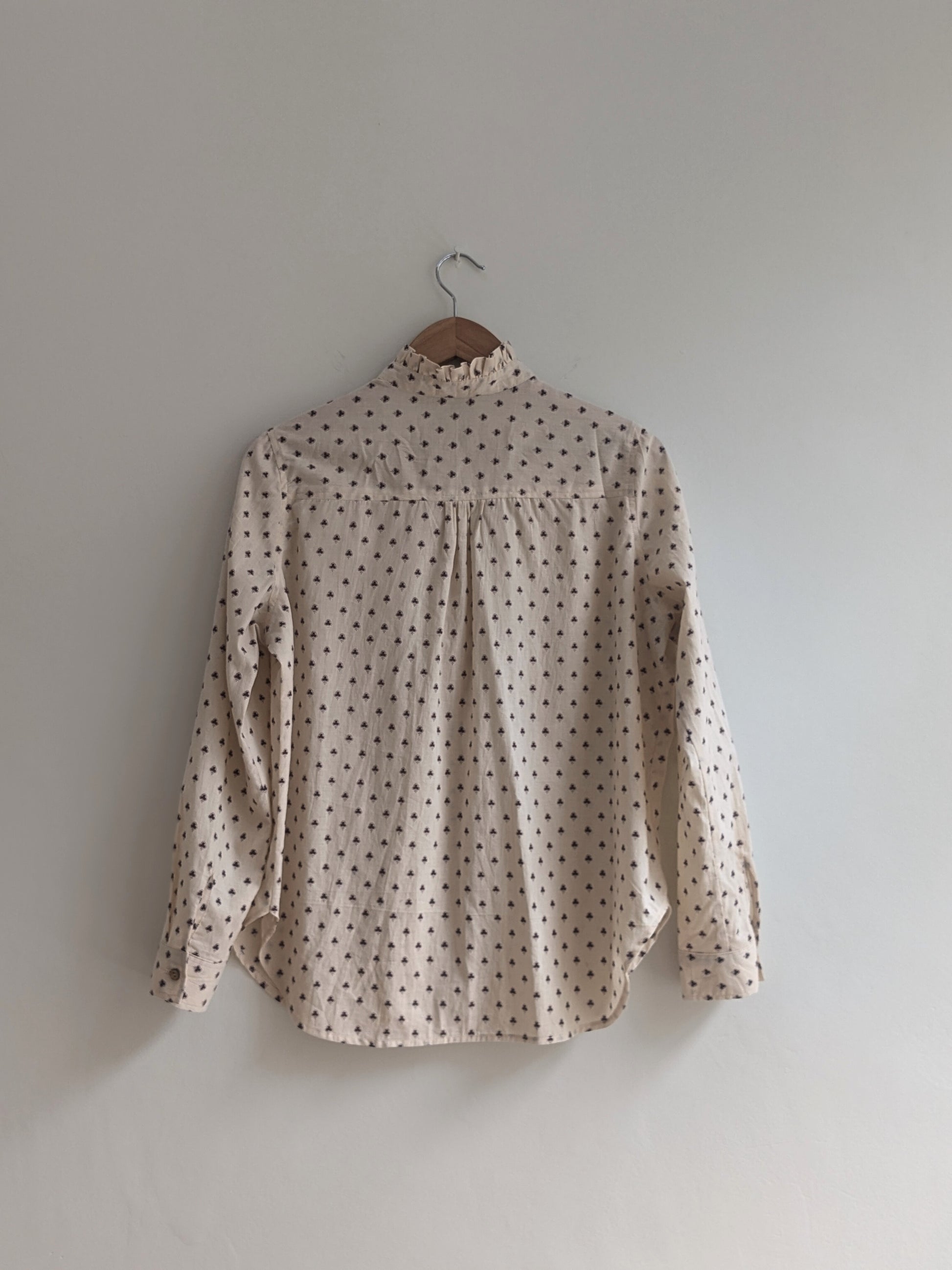 Women's full sleeves cotton ruffle shirt in peach colour - Back  Image