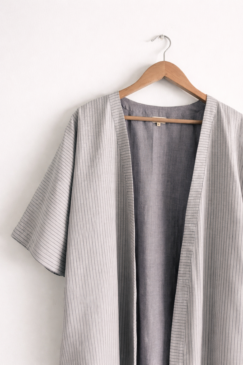 Dojo Wrap Long Coat in Grey Striped Cotton Double Cloth with Kimono Sleeves - Front closeup image