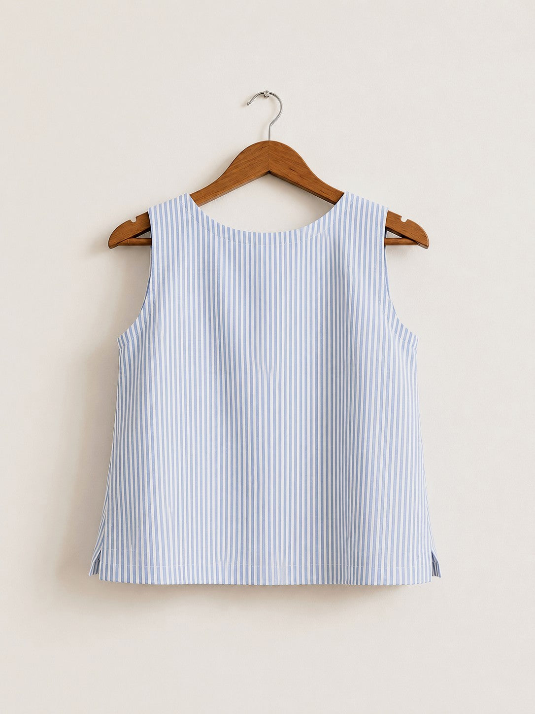 Women's sleeveless top made with cotton linen in light blue - back image