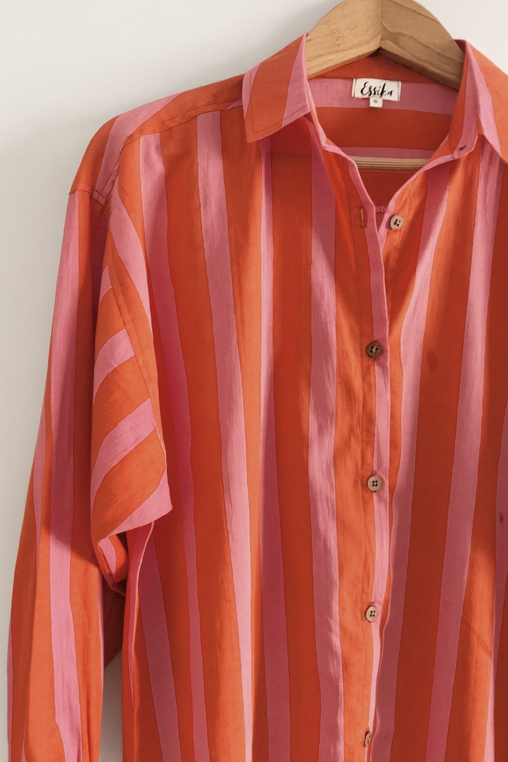 Women's cotton oversized shirt in red and pink stripes, full sleeves - closeup image
