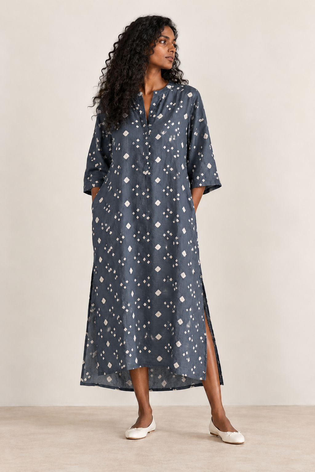 Women's caftan in  slate blue with 3/4 sleeves and v-neck made with cotton bandhani -model image