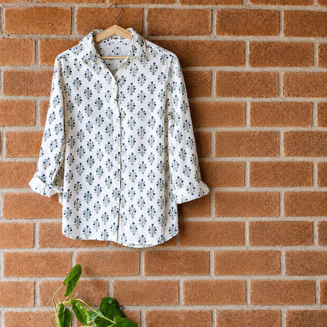 Women's regular fit, cotton full sleeves shirt in teal and indigo floral block print - front image