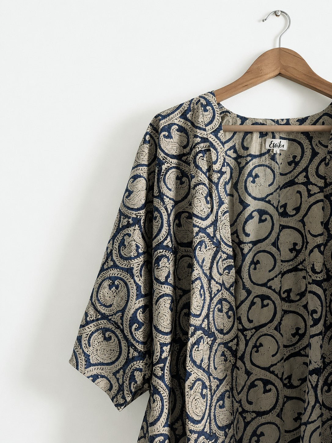 Women's jacket with kimono sleeves in indigo made with cotton block print - close up image