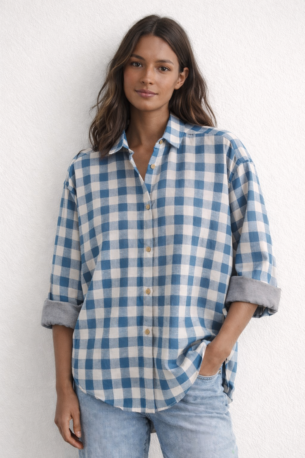 Women’s oversized shirt in blue & white check cotton double cloth with collar neck and cuffed sleeves – Model image, front view
