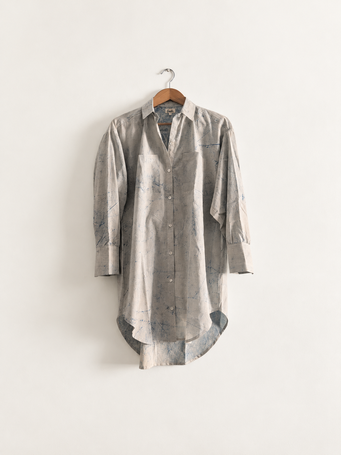 Women's shirt dress in cotton block print with full sleeves and collar in white and blue - front full image