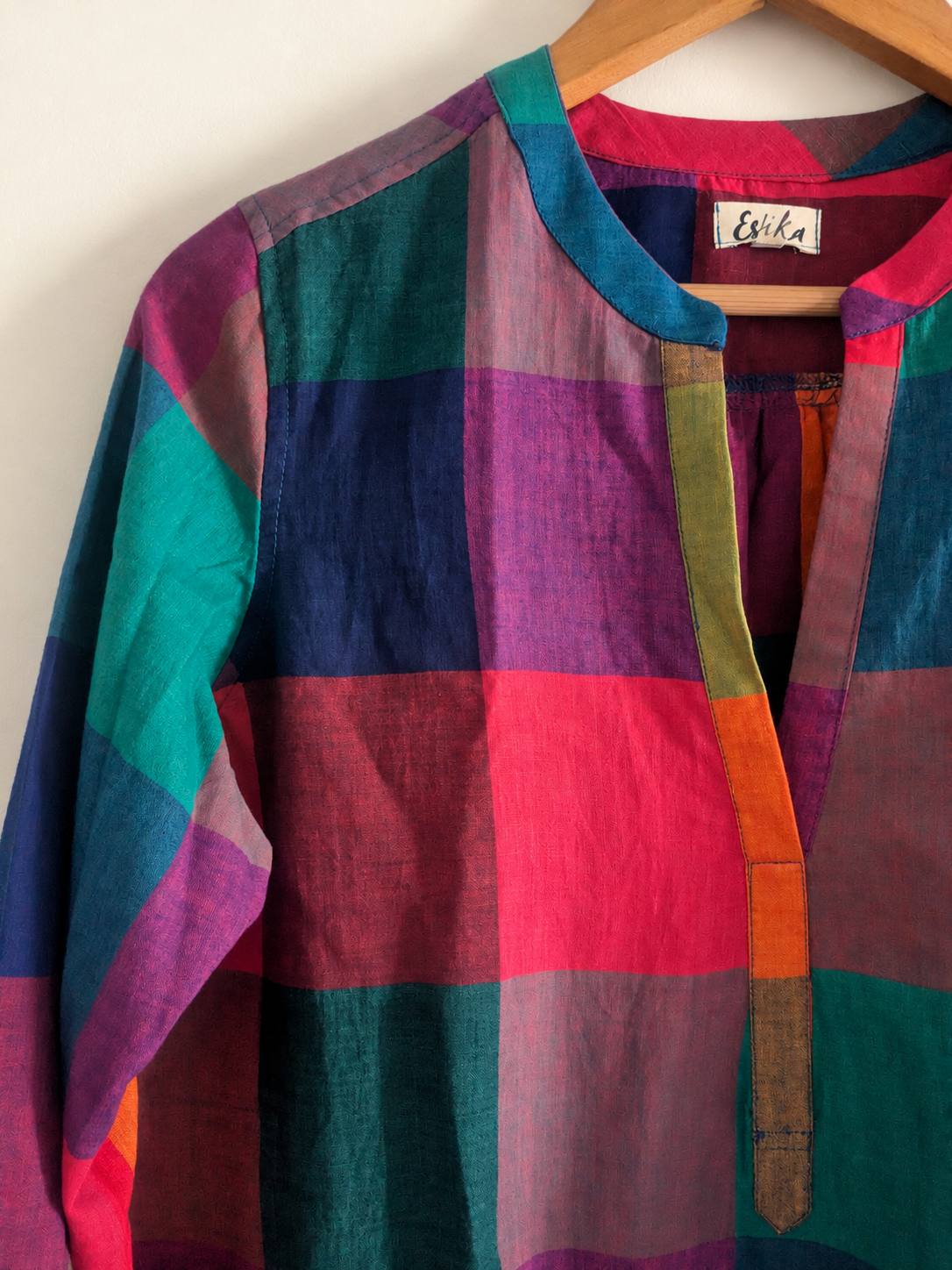 Women's  caftan in v neck, full sleeves and cuffs.  Made with 100% handloom cotton in multicolour checks -close up image