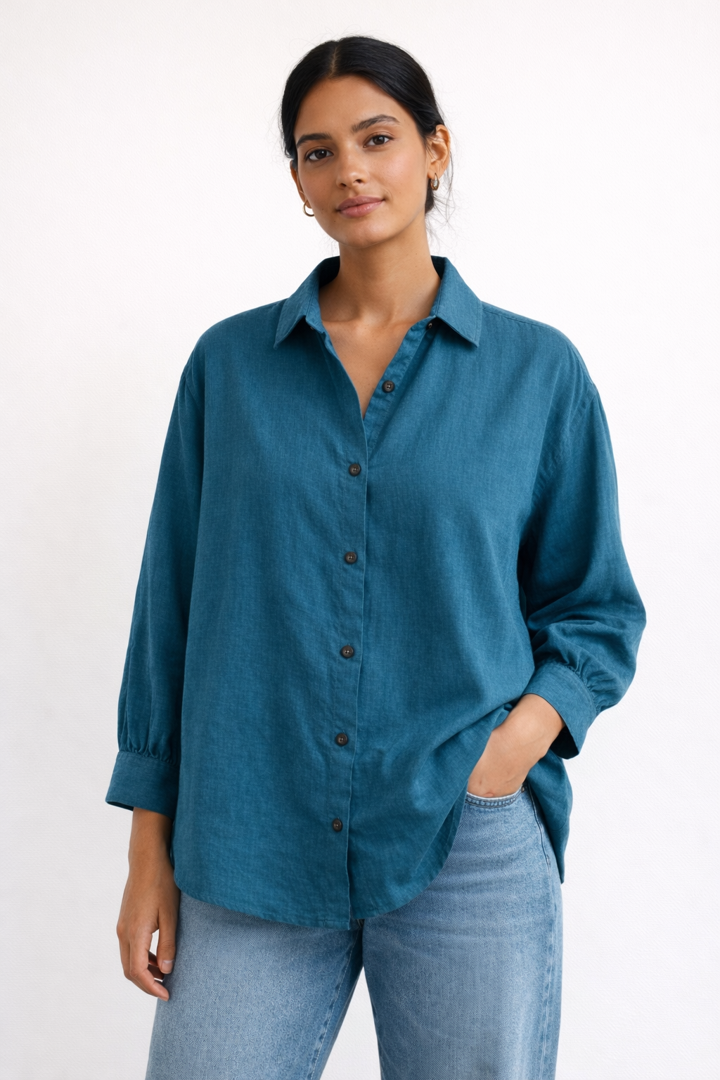 A women’s oversized full-sleeve shirt in teal with a relaxed and comfortable fit - Model image