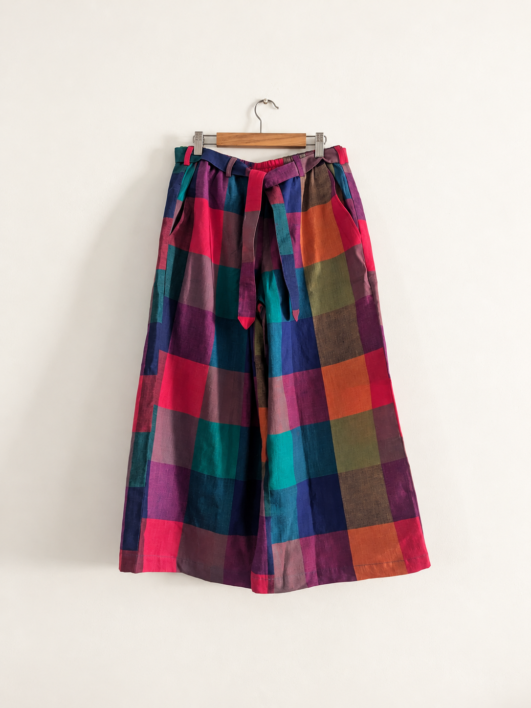 Women’s ankle-length wide-leg pants made from handloom cotton in multicolour checks, paired with a separate matching belt - front image