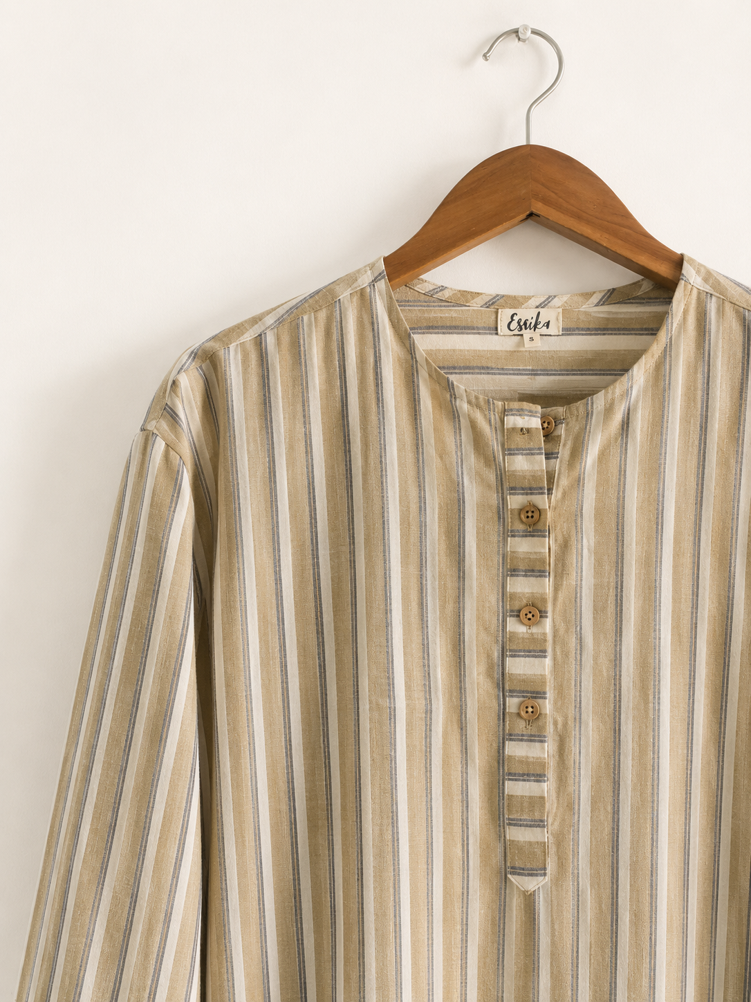 Women's handloom cotton kurta with round neck, full sleeves with cuffs, in yellow stripes– closeup image