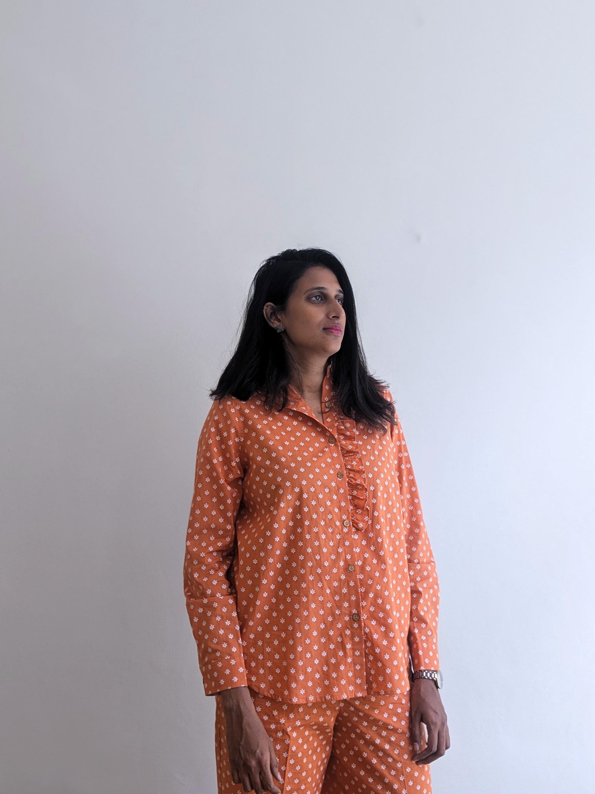 Women's full sleeves cotton ruffle shirt in  orange  - front image